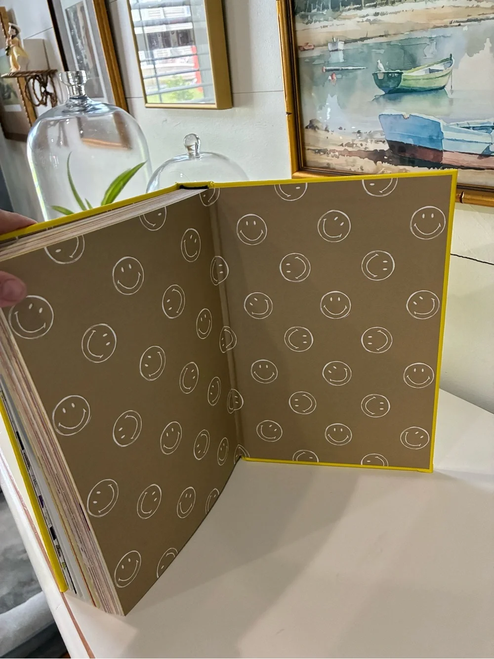 ✨ Brighten up your home with this stunning, vibrant yellow Assouline pop-culture